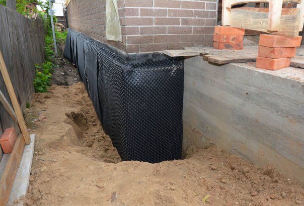 SJ Waterproofing Pros technician performing targeted Basement Waterproofing assessment in Rochelle Park, NJ